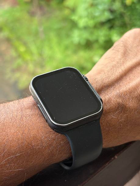 istock closeup of a smart watch holding  on a man wrist 2225957749