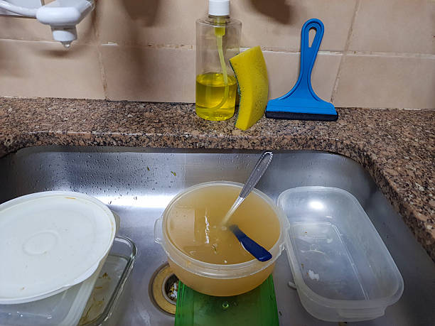 istock Kitchen sink with dirty dishes 2225972297