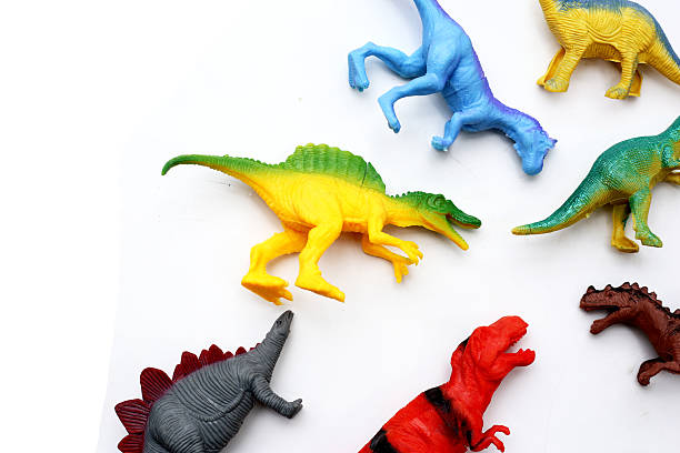 istock Plastic dinosaur toys on white background 2225973136