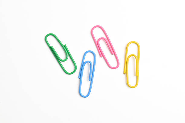 istock Colorful paper clips on white background 2225975295