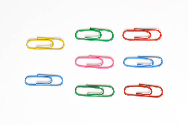 istock Colorful paper clips on white background 2225975408