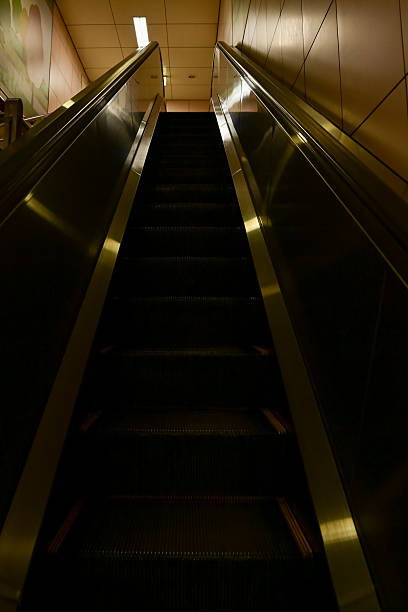 istock Close-up of the escalator. escalator convergence line. Indoor view. 2225977524