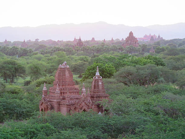 Evening mist hangs over the Buddhist temples of Bagan in Myanmar