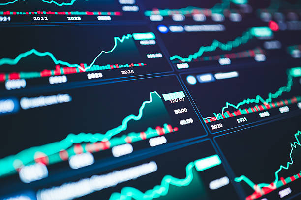 istock A visually striking image of dynamic market graphs in motion, ideal for content on crypto volatility, AI trading algorithms, fast-paced markets, and financial trend predictions. 2225981353