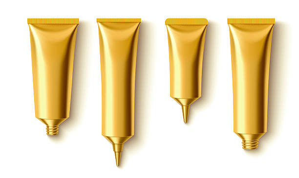 istock Golden metal cream tubes 2225988803