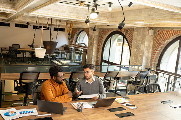 istock Colleagues working on a project and looking involved while discussing the details 2225990840