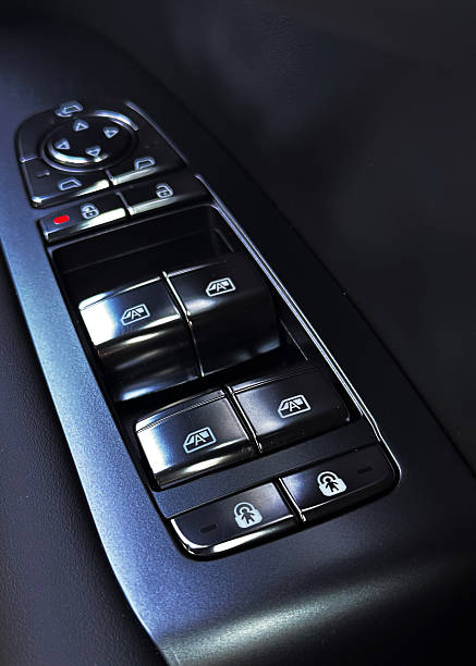 istock Close-Up of Car Interior Door Panel with Window and Mirror Controls 2225993870