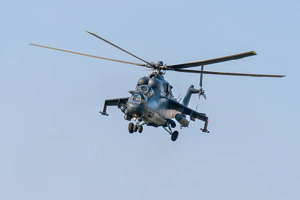 istock Soviet-made black old military helicopter flying in the sky in Budapest 2225994453