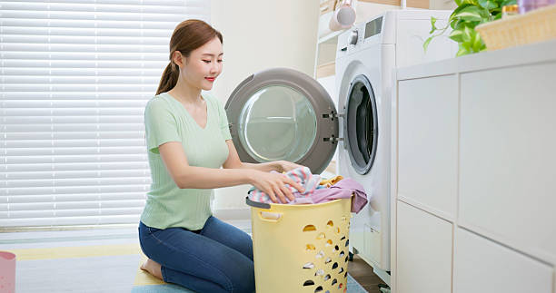 istock asian Housewife Unloads Laundry 2225996123
