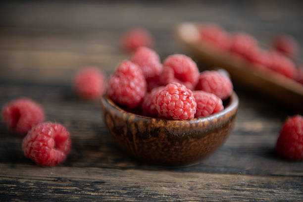 London UK, June 04 2025, A Bowl Of Fresh Ripe Sweet Raspberries Fruit