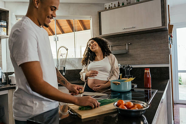 istock Couple preparing lunch together 2226003997