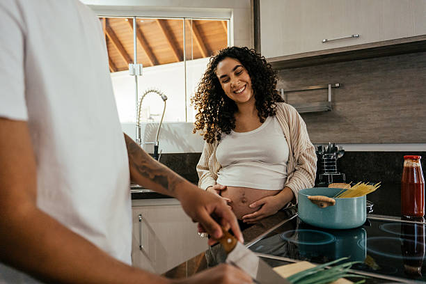 istock Couple preparing lunch together 2226004000