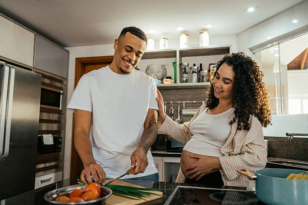 istock Couple preparing lunch together 2226004013