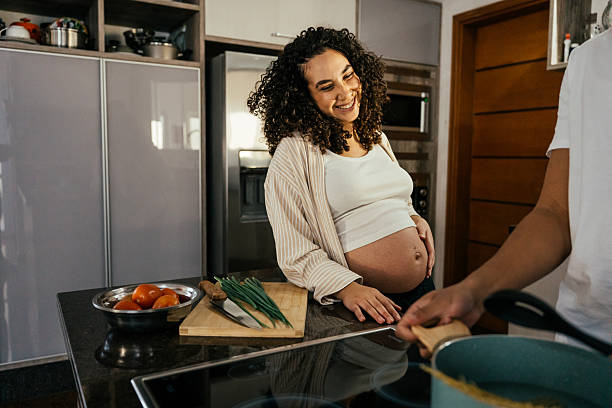 istock Couple preparing lunch together 2226004016