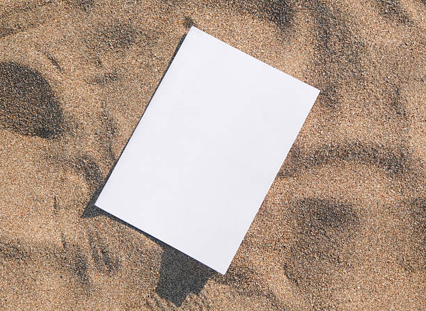 istock blank magazine mockup on sandy beach 2226005585