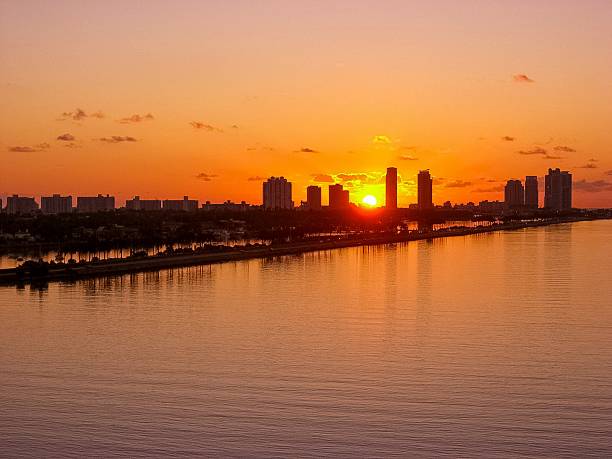istock A golden sunset over the Miami skyline, reflecting in the tranquil waters, creating a serene, breathtaking atmosphere. 2226021021