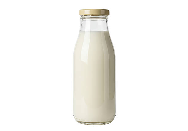 Isolated Vintage Glass Milk Bottle with Cream