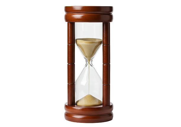 istock Isolated Wooden Hourglass with Flowing Sand 2226022563