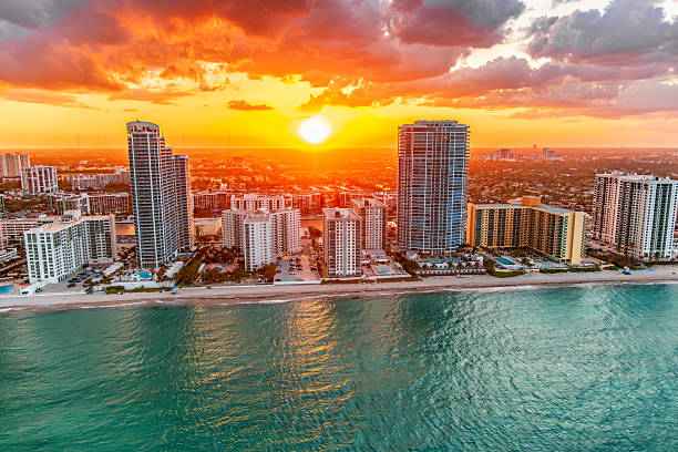 High rise condo buildings lining the beaches of Hollywood Florida located between Miami and Fort Lauderdale shot via helicopter from an altitude of a bout 700 feet.