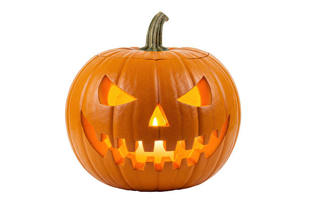 Isolated Carved Halloween Pumpkin with Candlelight