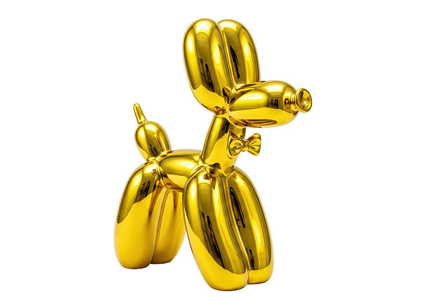 Isolated Golden Balloon Dog Sculpture with Shiny Surface