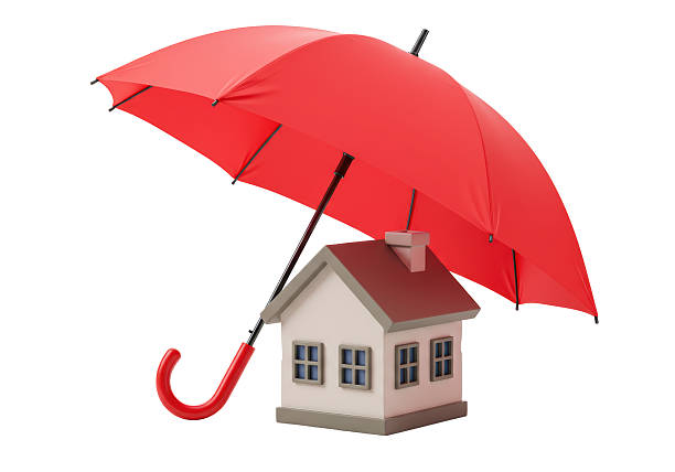 Ribe, Denmark June 10, 2025 A man walks in the rain with a large red umbrella.