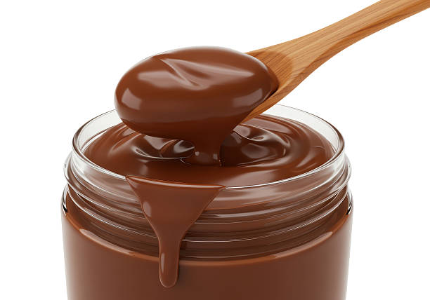 istock Isolated Creamy Chocolate Spread in Glass Jar with Spoon 2226027835