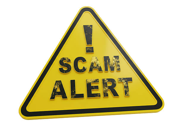 istock Isolated Cautionary Scam Alert Sign in Yellow and Black 2226029730