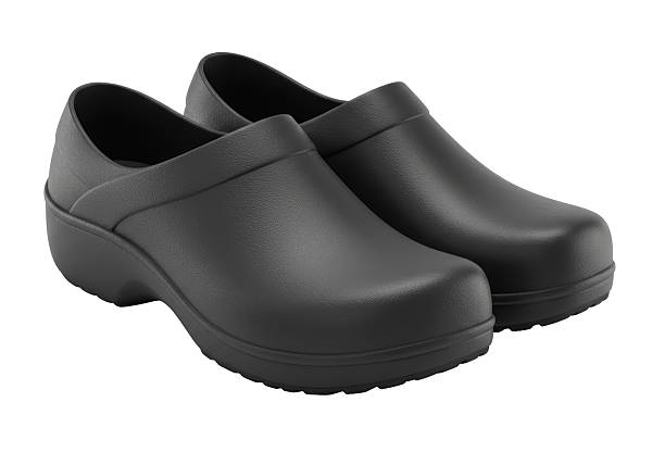 Isolated Pair of Black Clogs Stylish and Practical Footwear