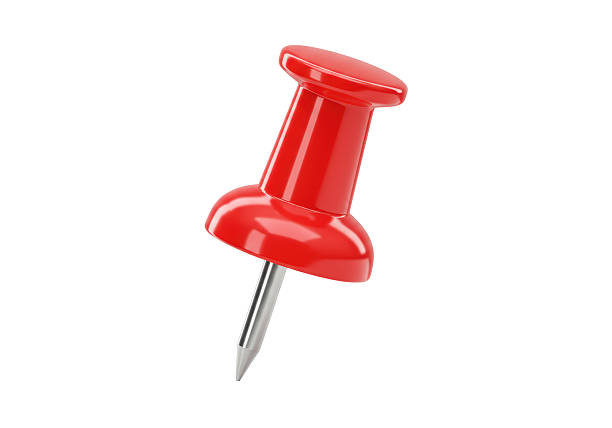 close up of a pushpin on white background