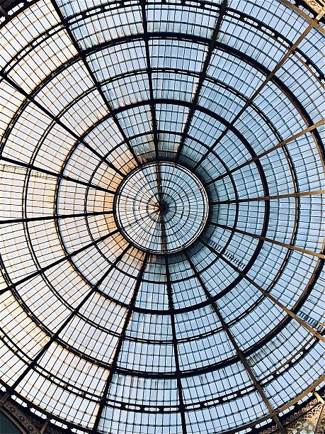 The glass dome of the building. Round roof construction. Modern architecture.
