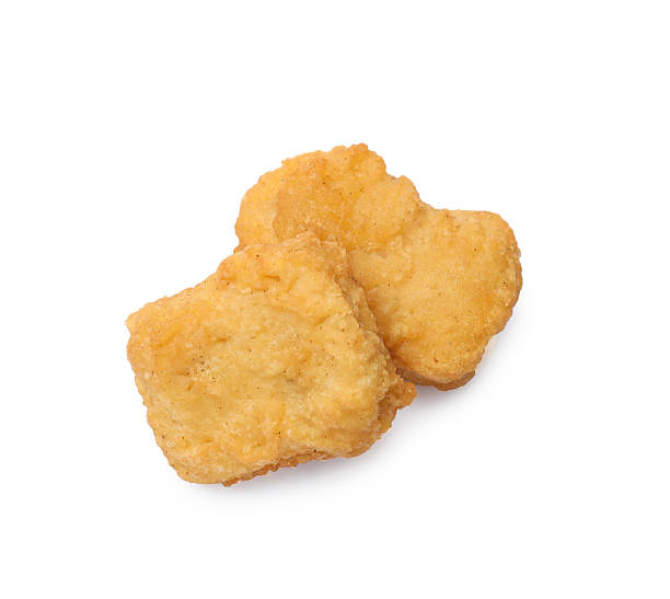 istock Delicious chicken nuggets isolated on white, top view 2226033775