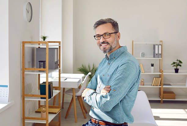 istock Successful middle-aged business man looking at camera with confident expression on his face. 2226037752
