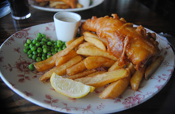 istock Fish and chips with peas and tartar sauce 2226040412