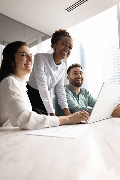 istock Group of happy diverse professionals collaborate in office 2226042224