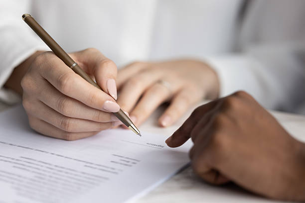 istock Client signing contract, authorizing service agreement, close up 2226044750