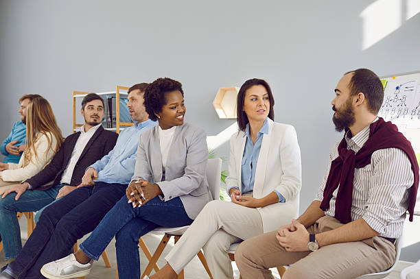 istock Different groups of people communicate with each other during business seminar or training. 2226048025
