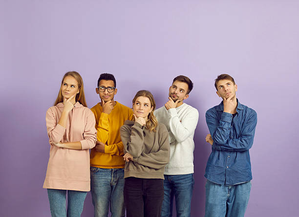 istock Diverse group of puzzled people thinking about problem or doubting their decisions 2226057063