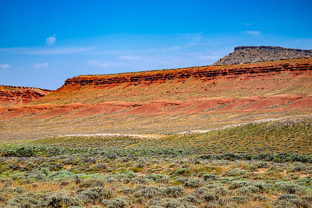 Red rock formations and meadow with sagebrush