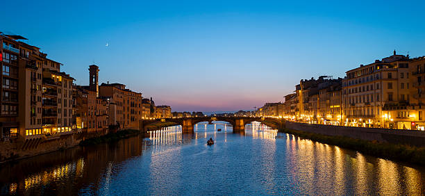 istock Firenze - A sunset flow on the Arno with a crescent moon 2226061672