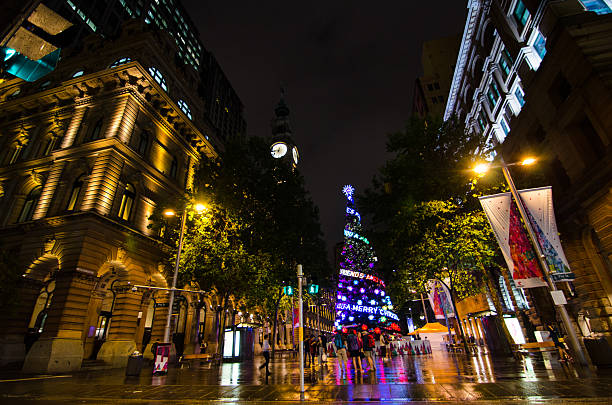 Sydney, Australia. – On November 28, 2017. - Christmas tree sparkles at Martin Place  providing a visual spectacle and light up the branches of the tree.