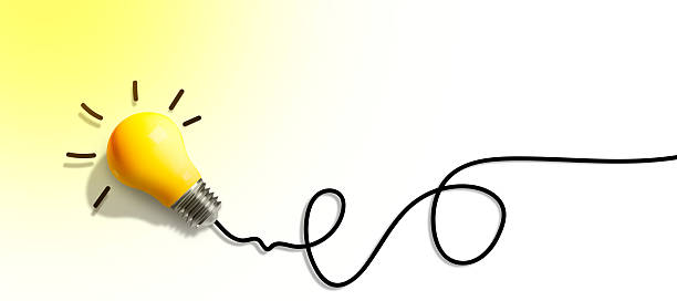 istock Flat lay of a yellow light bulb on a clean background, symbolizing brainstorming, creativity, and innovation. Minimalist concept for idea generation, inspiration, and smart thinking in business or education. 2226067856