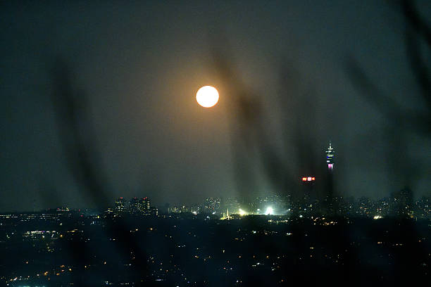 Rising full moon, Johannesburg.