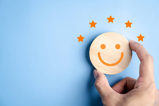 istock Happy smile face and satisfaction rating with five star feedback customer experience, positive review, service quality, and emotional happiness. 2226074226