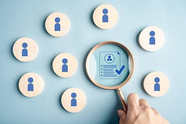 istock Human resource with candidate profile magnifying glass, representing recruitment, resume review, job interview, and HR hiring process. 2226074234