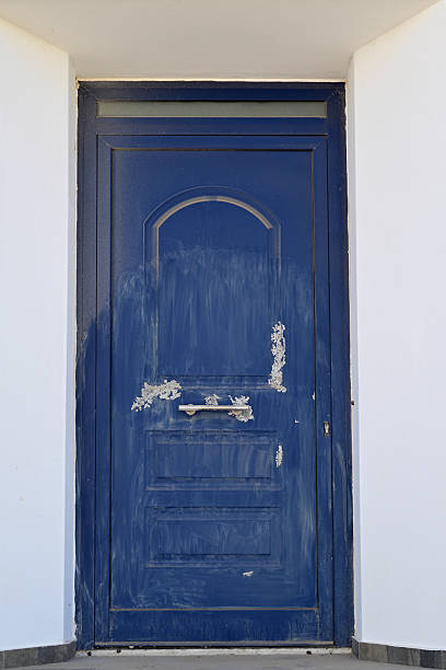 istock Blue door on a house in Greece 2226078083