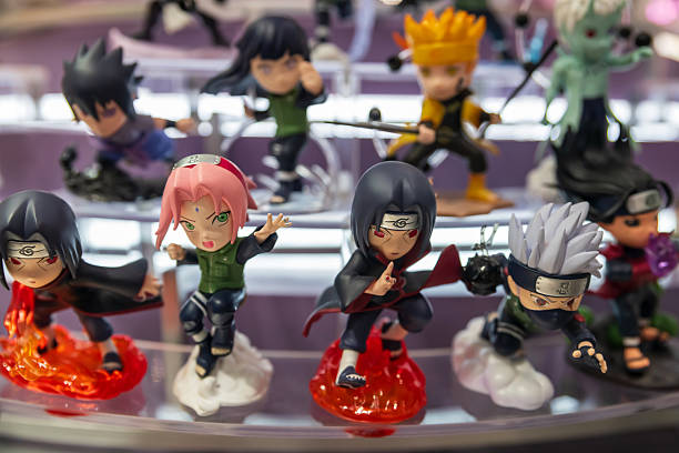Shanghai, China - April 12, 2025: Itachi Uchiha, Kakashi Hatake, and Sakura Haruno Figures in Pop Mart flagship store at Nanjing East Road. Famous Japanese manga.