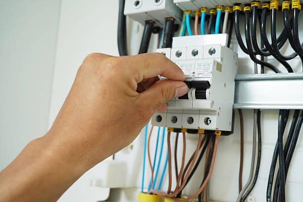 istock Electrician working checking a switchboard with fuses 2226093547