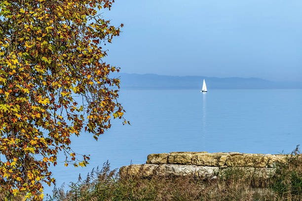 Autumn day in Geneva, Switzerland. Geneva is the second-most populous city in Switzerland. Situated in the south west of the country, where the Rhône exits Lake Geneva, it is the capital of the Republic and Canton of Geneva.