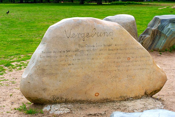 Close-up of an old fashioned engraving of the word 'George' in stone.